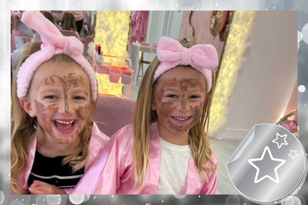 Children with face paint and headbands at a Silver package party